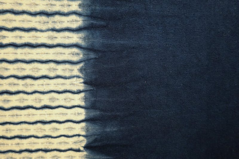 Indigo-dyed fabric wave pattern